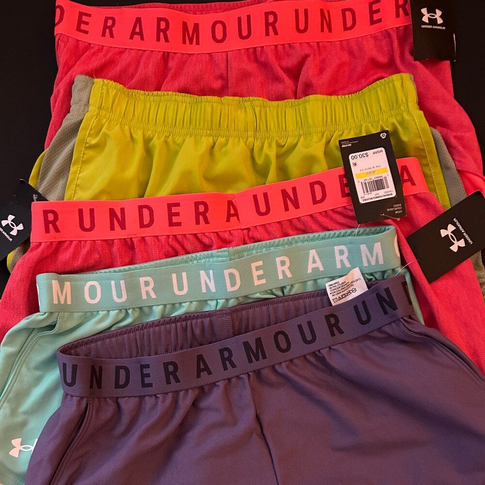 Under Armour Women 3 Large 2 Medium Shorts with pockets. Includes 1 Nike Short.